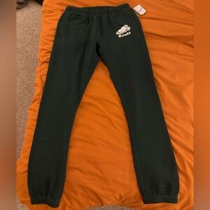 Roots Dark Green Sweatpants with White Logo